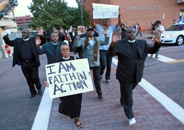 Multi-faith clergy march for demands